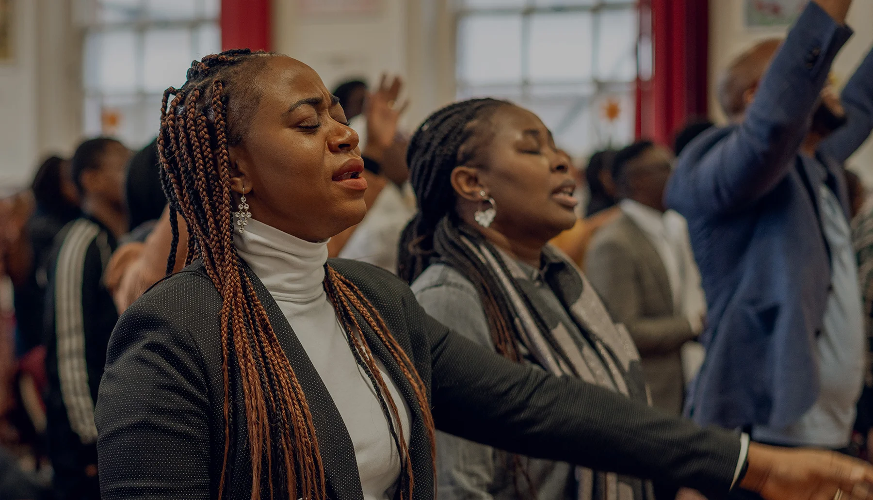 Members of City of David Canterbury worshipping together